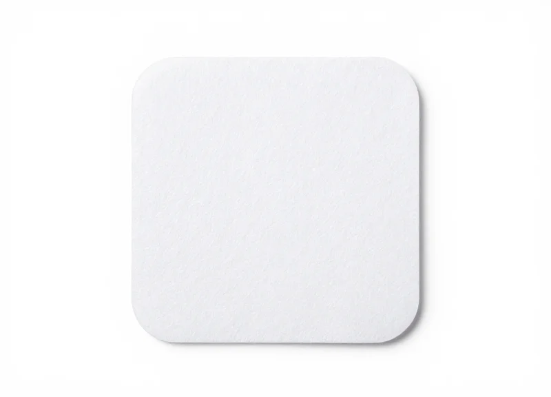 A single 15mm white EAS soft label on a pure white background.