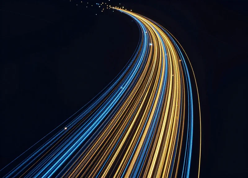 Abstract visualization of glowing data streams moving upward, representing financial growth and reduction in loss.