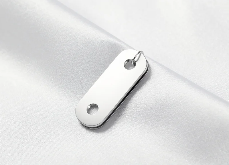 Close-up of a delicate silk garment showing no damage from modern security tagging.