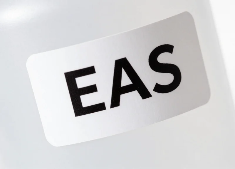 Macro view of a specialized EAS security label adhered to a chemical container