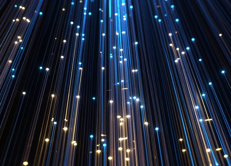 Abstract digital data visualization showing glowing streams of light rising upwards representing profit growth.