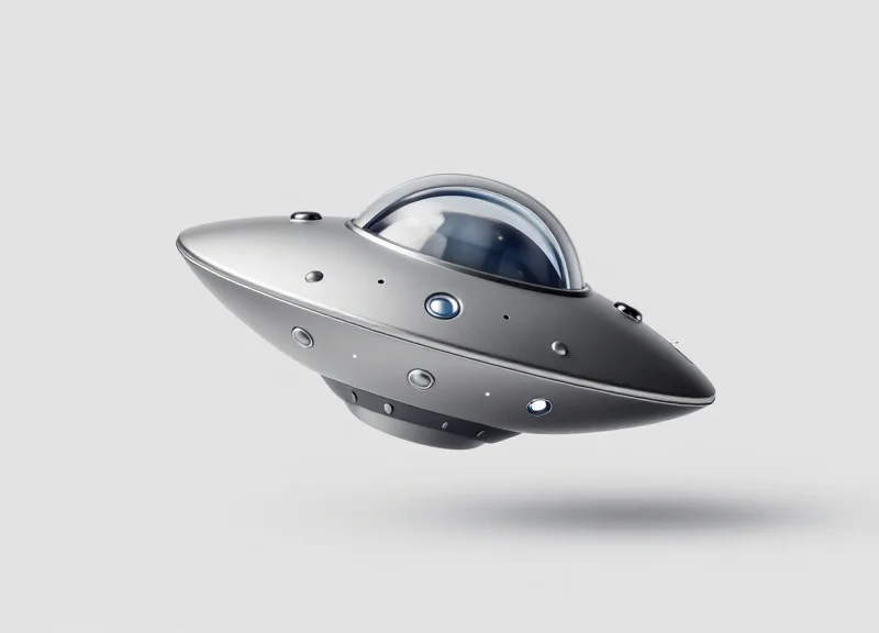 A designer UFO-shaped security tag with a metallic finish