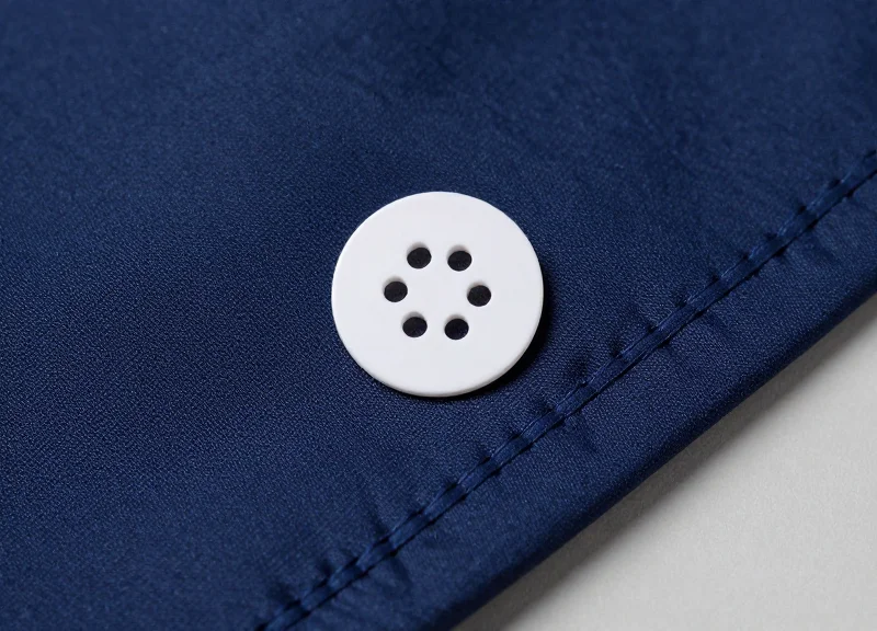 Close-up of an RFID tag sewn into the hem of a textile garment