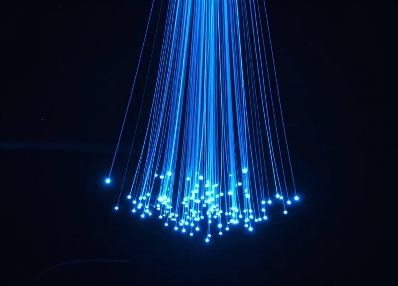 Abstract visualization of powerful 9dBi+ RFID signal waves extending vertically through high shelving units.