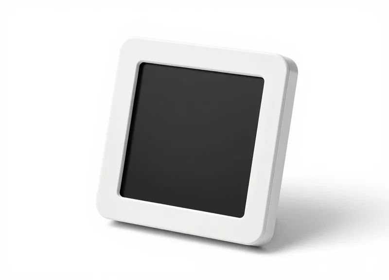 Close-up of a compact 1.54-inch electronic shelf label with a sleek white frame.