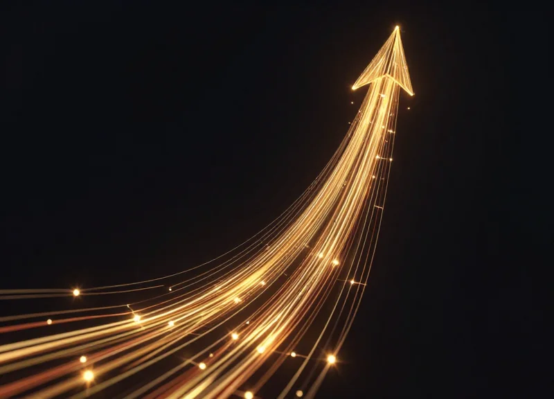 Abstract visualization of a steep upward trend with golden light trails representing a sales surge.