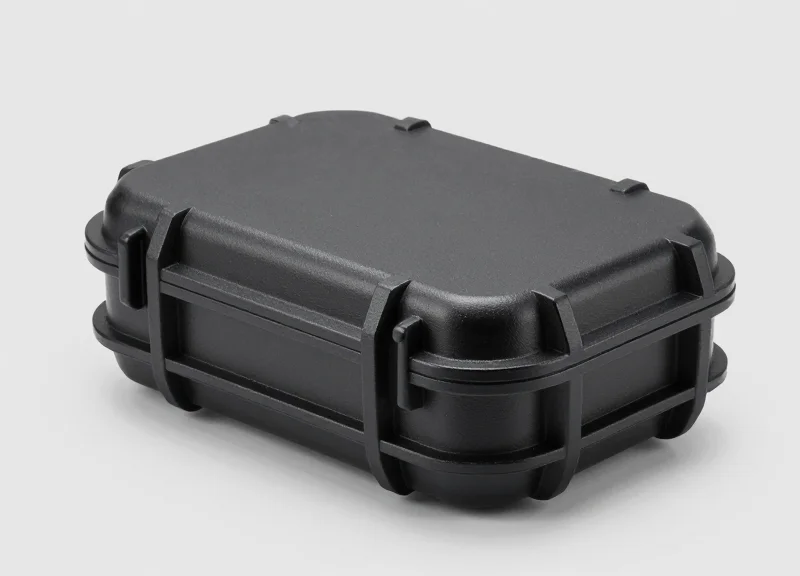 Close-up of a rugged, waterproof industrial casing for an electronic device.