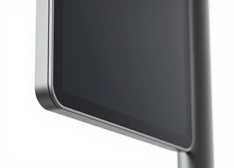 Close-up of a premium slim electronic shelf label showcasing its ultra-thin profile and metallic finish on a white background.