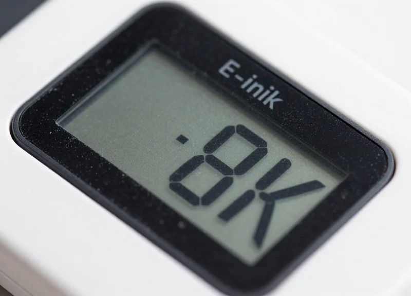 Macro view of an e-ink screen showing high clarity despite frost crystals.